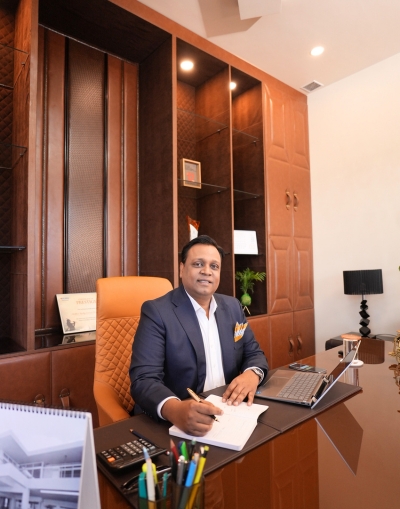 Photograph of Sameer Gupta, Director of Shikhar Realty Services Pvt. Ltd. , seated in his office—displaying professionalism, vision, and the leadership that defines one of Faridabad’s leading real estate firms.