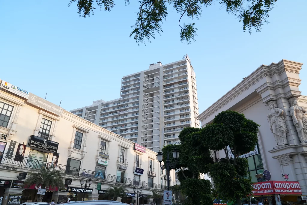 Commercial shops and high-rise residential tower at Omaxe World Street in Faridabad