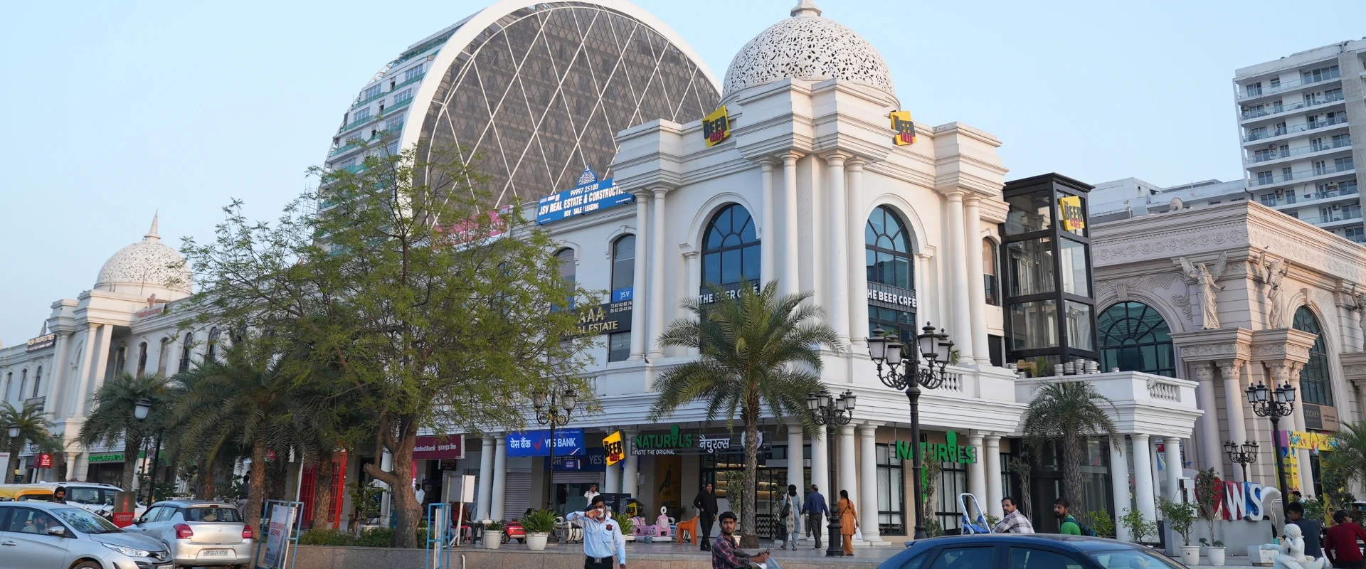 Panoramic view of Omaxe World Street in Sector 79, Faridabad, showcasing its international architectural design inspired by global shopping streets.