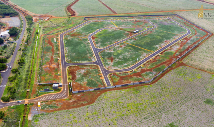 Navraj DMX Urban Greens premium plotted township on Delhi–Mumbai Expressway with resort-style living