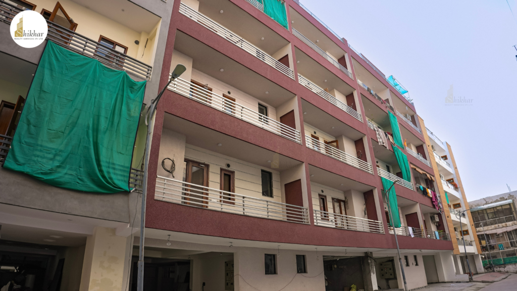 Secure gated entrance with round-the-clock security at RPS Palm Drive